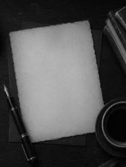 Grayscale Kindle preview of Dark academia desk